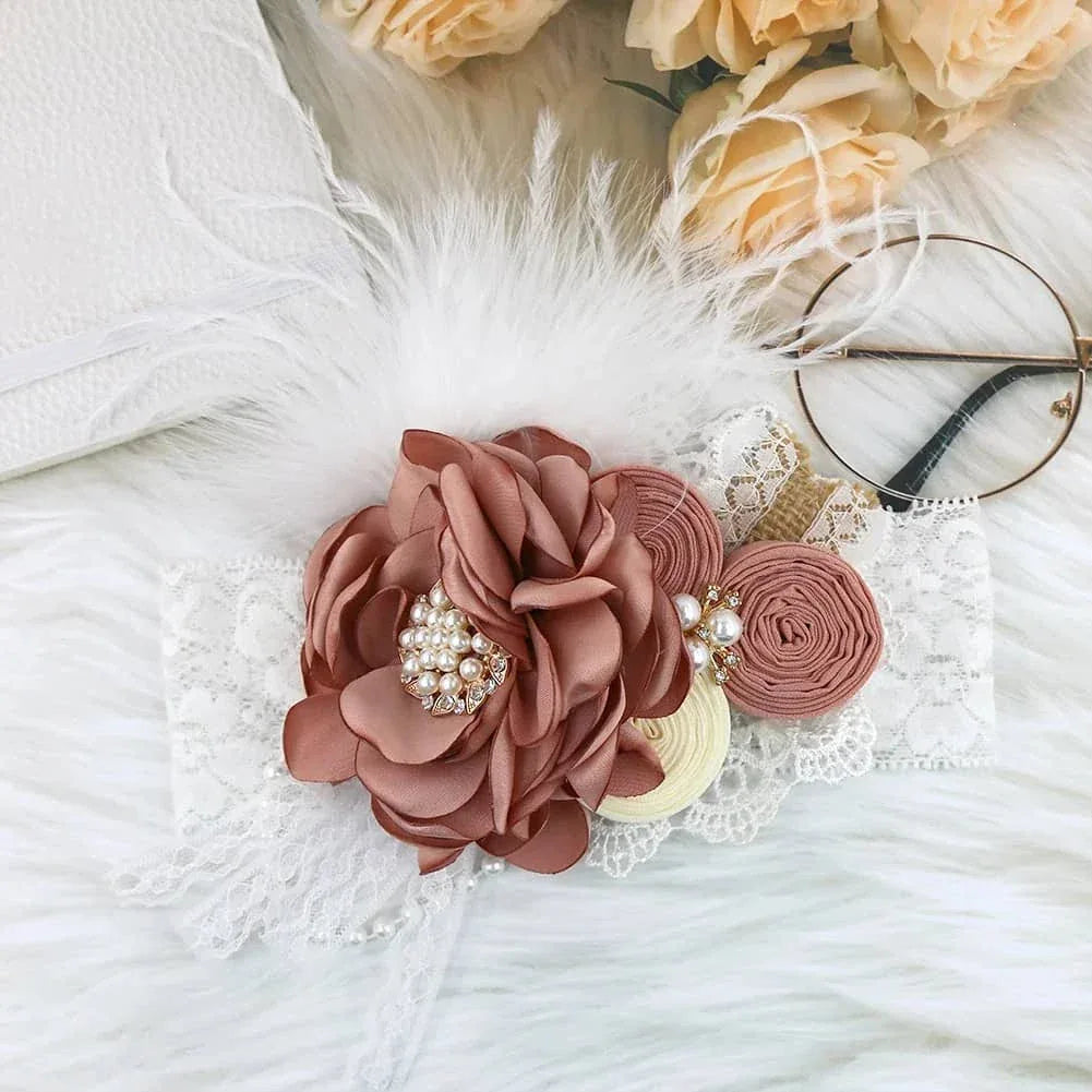 beaded floral baby headband with large dusty pink flower and pearls on white lace for infants