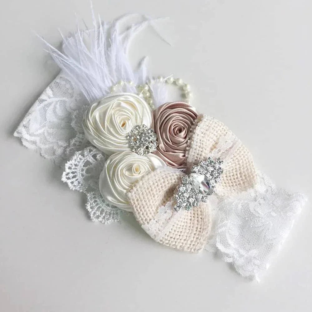 White and beige beaded floral baby headband for infants with lace, satin flowers, and rhinestone accents