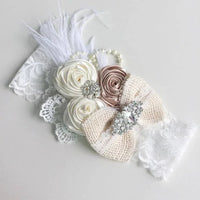 White and beige beaded floral baby headband for infants with lace, satin flowers, and rhinestone accents
