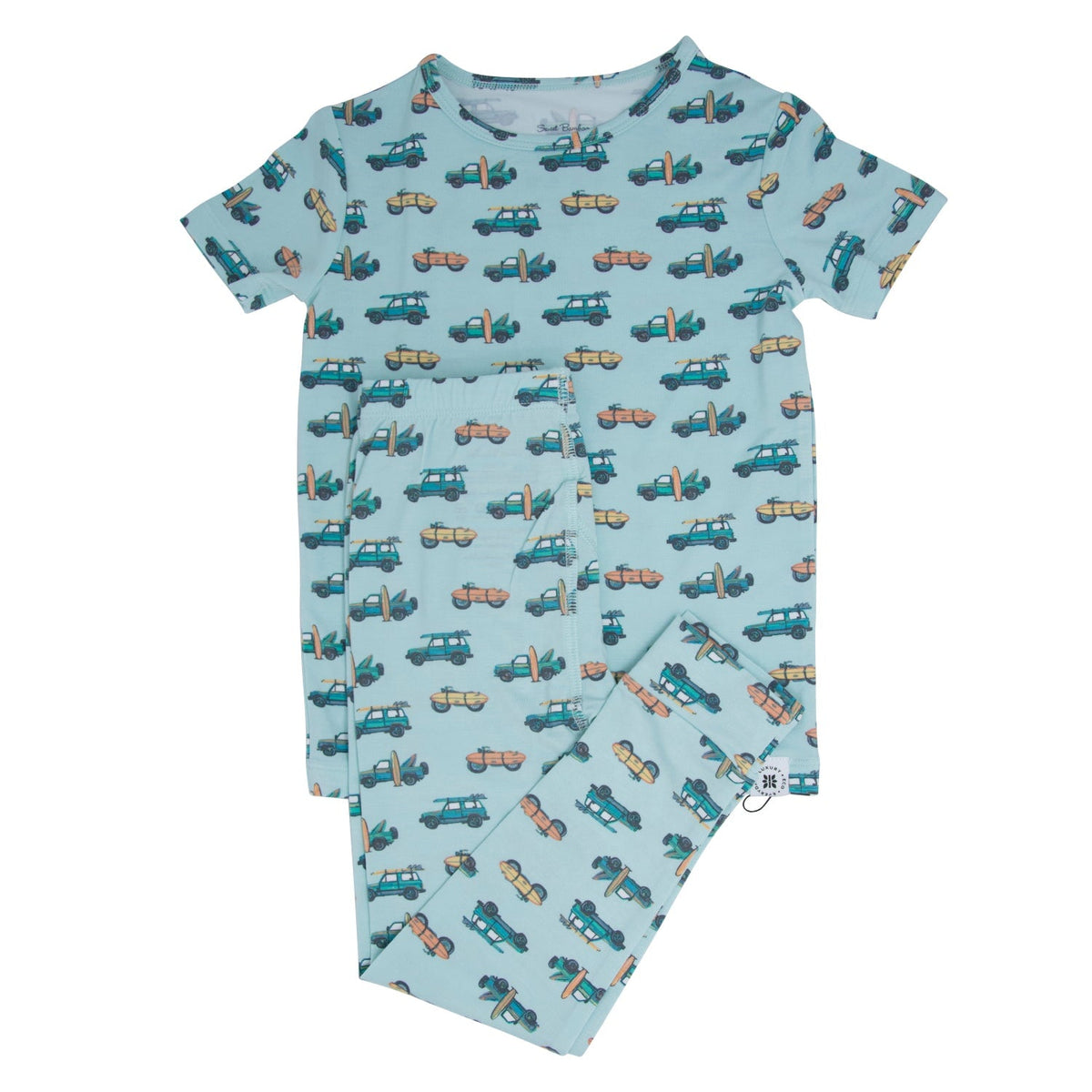 Baby romper with car pattern on a light blue background