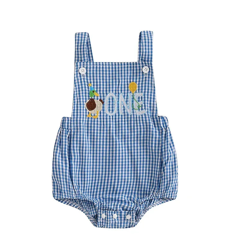 Blue gingham baby birthday romper with embroidered ONE text and party hat detail for 1 year olds