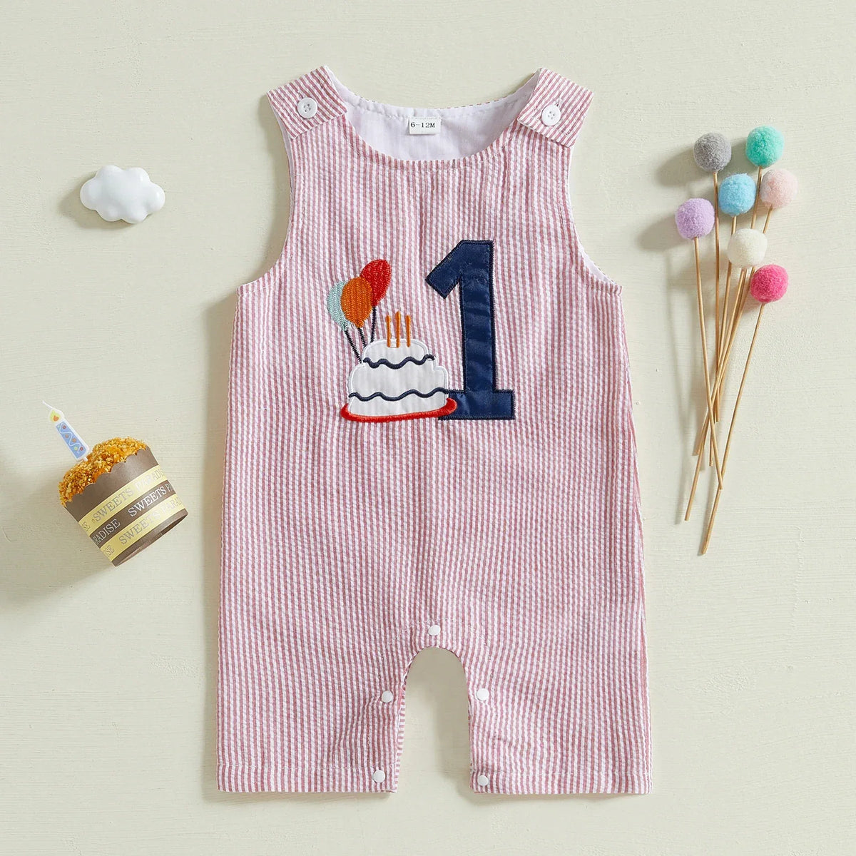 pink striped birthday romper for babies with number 1 and cake applique size 0 to 12 months