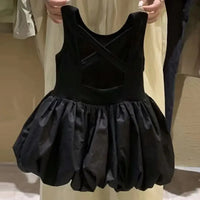 black girls party dress with cutouts in toddler size held up showing full front and skirt details