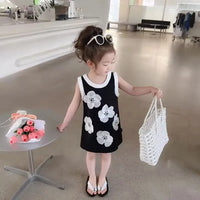 toddler girls black party dress with white floral print sleeveless and white sandals