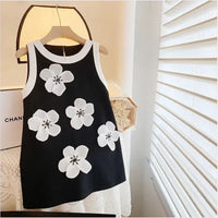 Black and white sleeveless party dress for girls with large white floral appliques
