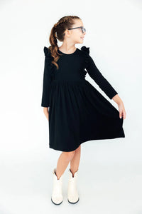 Girls black ruffle twirl dress for girls with long sleeves and ruffle shoulder details