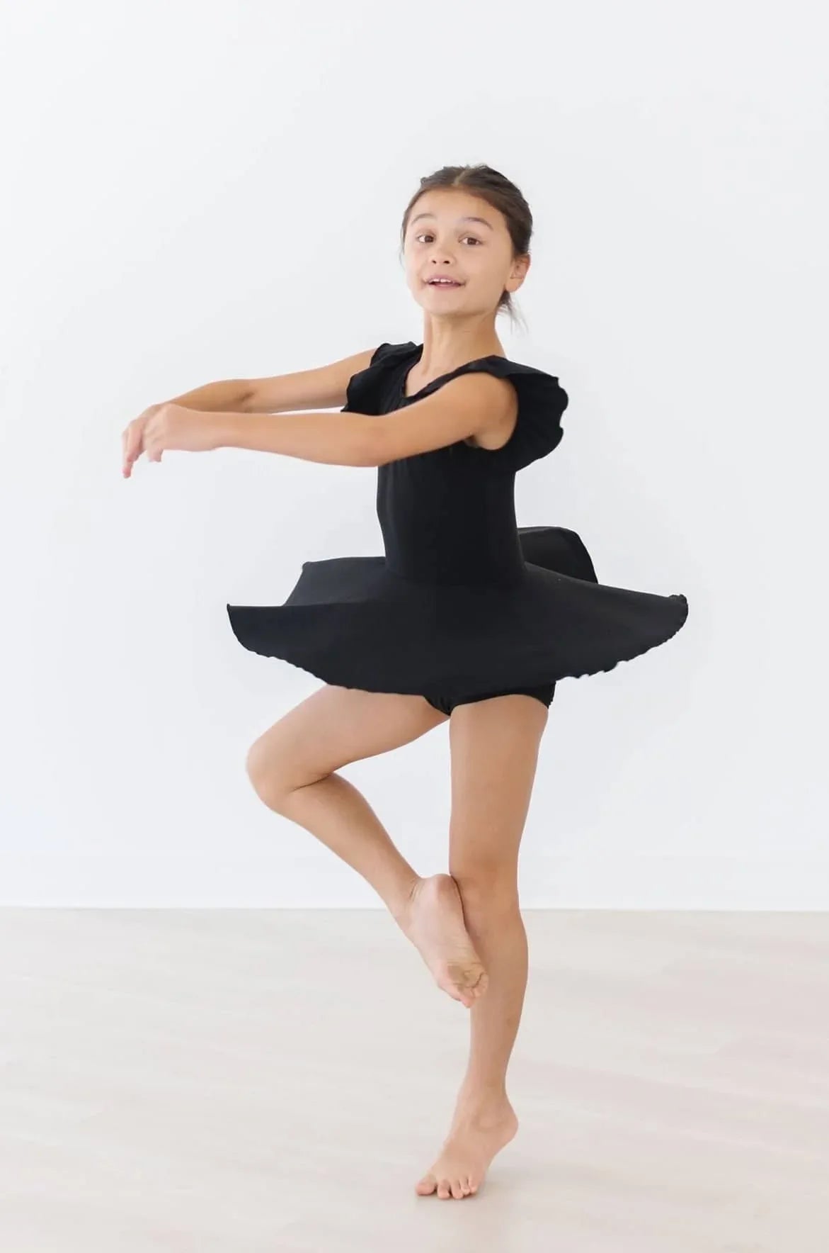 Chic Black Twirl Leotard for Toddlers Short Sleeve - The Palm Beach Baby