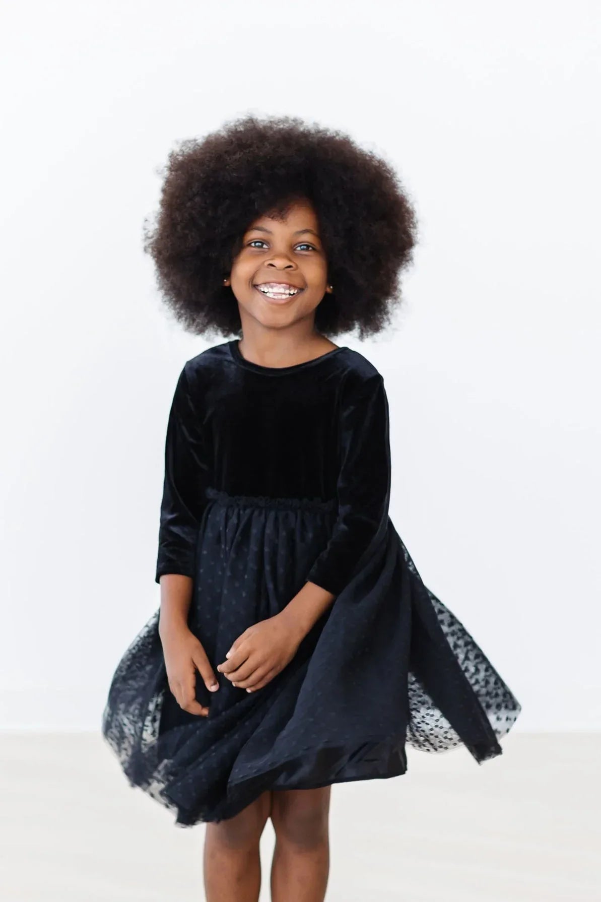 Girls black velvet tutu dress for girls with long sleeves and a fluffy tulle skirt