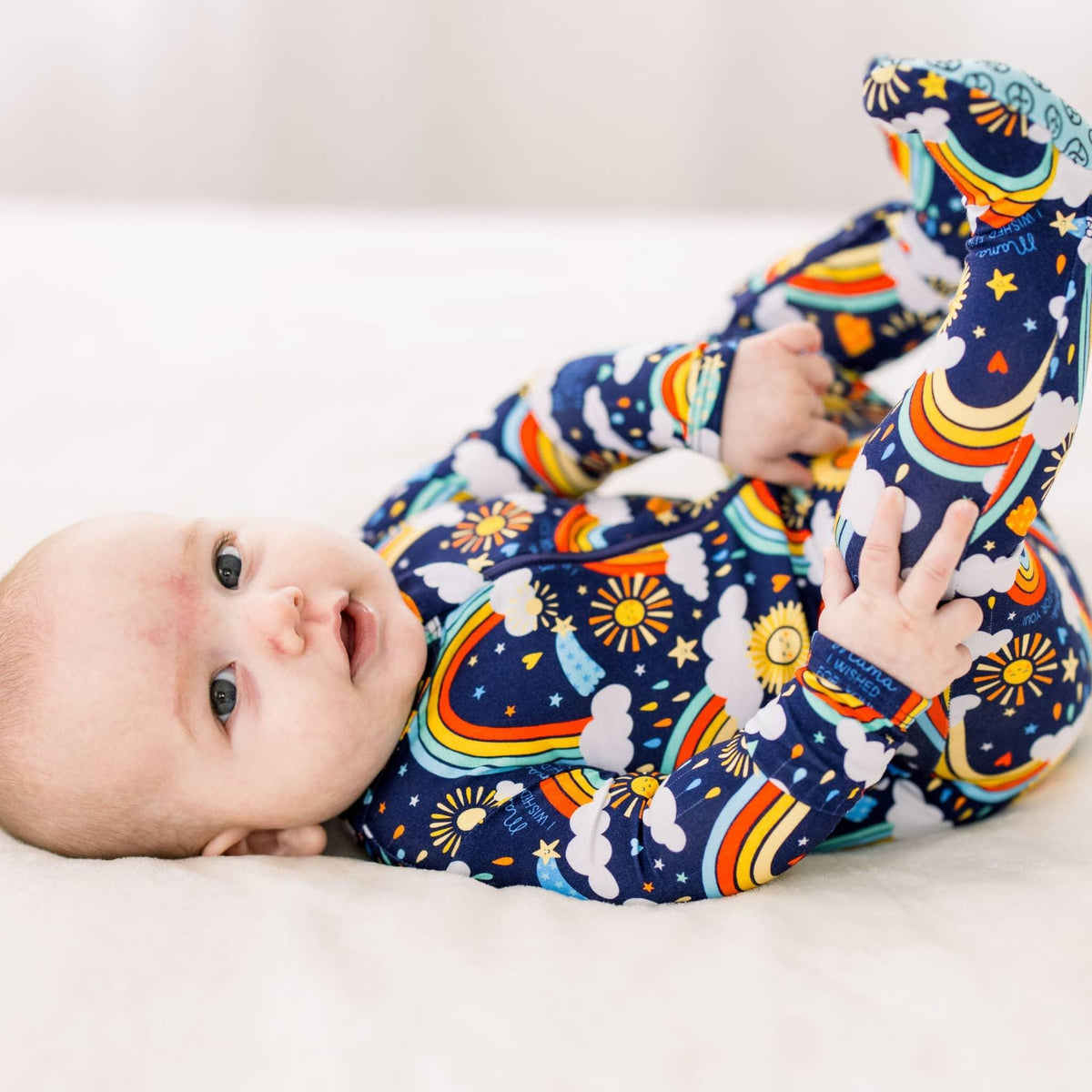 Raising Mama Blue Baby Footie Sleeper with Rainbow Print - The Palm Beach Baby