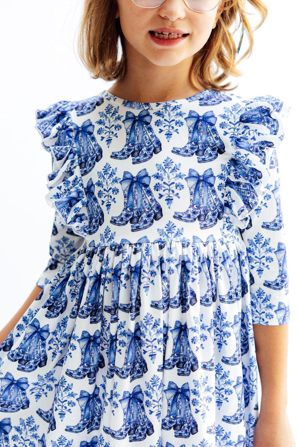 Girls blue and white 3/4 sleeve girls ruffle twirl dress with boot print and ruffle details