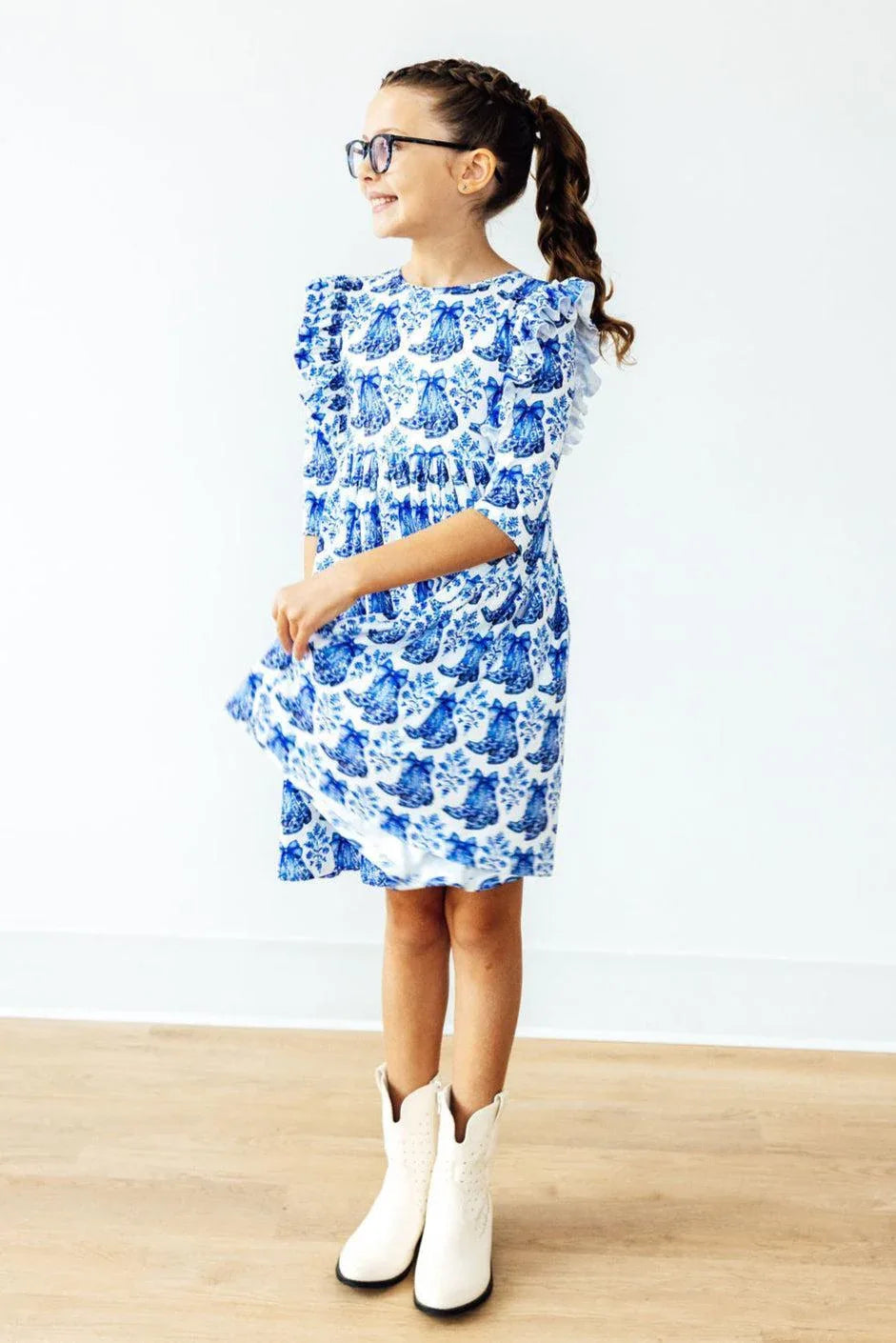 Girls blue and white girls ruffle twirl dress 3/4 sleeve with floral print worn by child