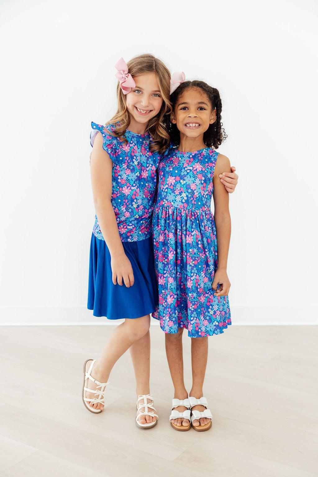 Girls blue floral tank dress twirl tank dress by Mila & Rose with ruffle sleeves and sleeveless design