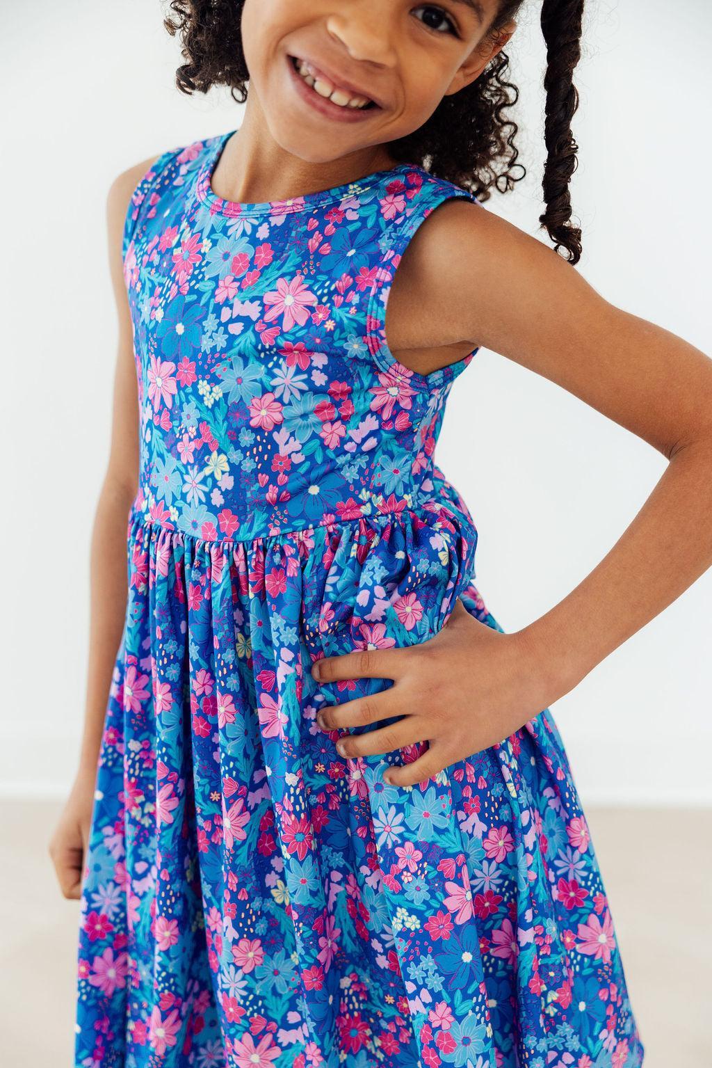 Girls blue floral twirl tank dress with pink and purple flowers by Mila & Rose