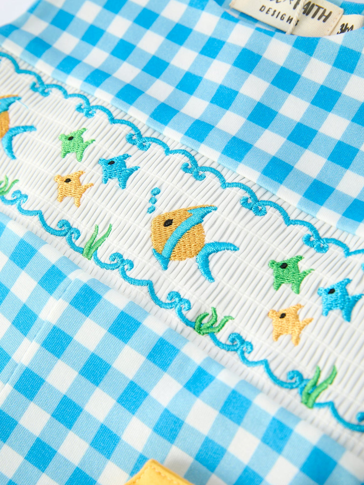 Rylee Faith Designs blue check fish embroidery baby romper with colorful fish embroidery for infants