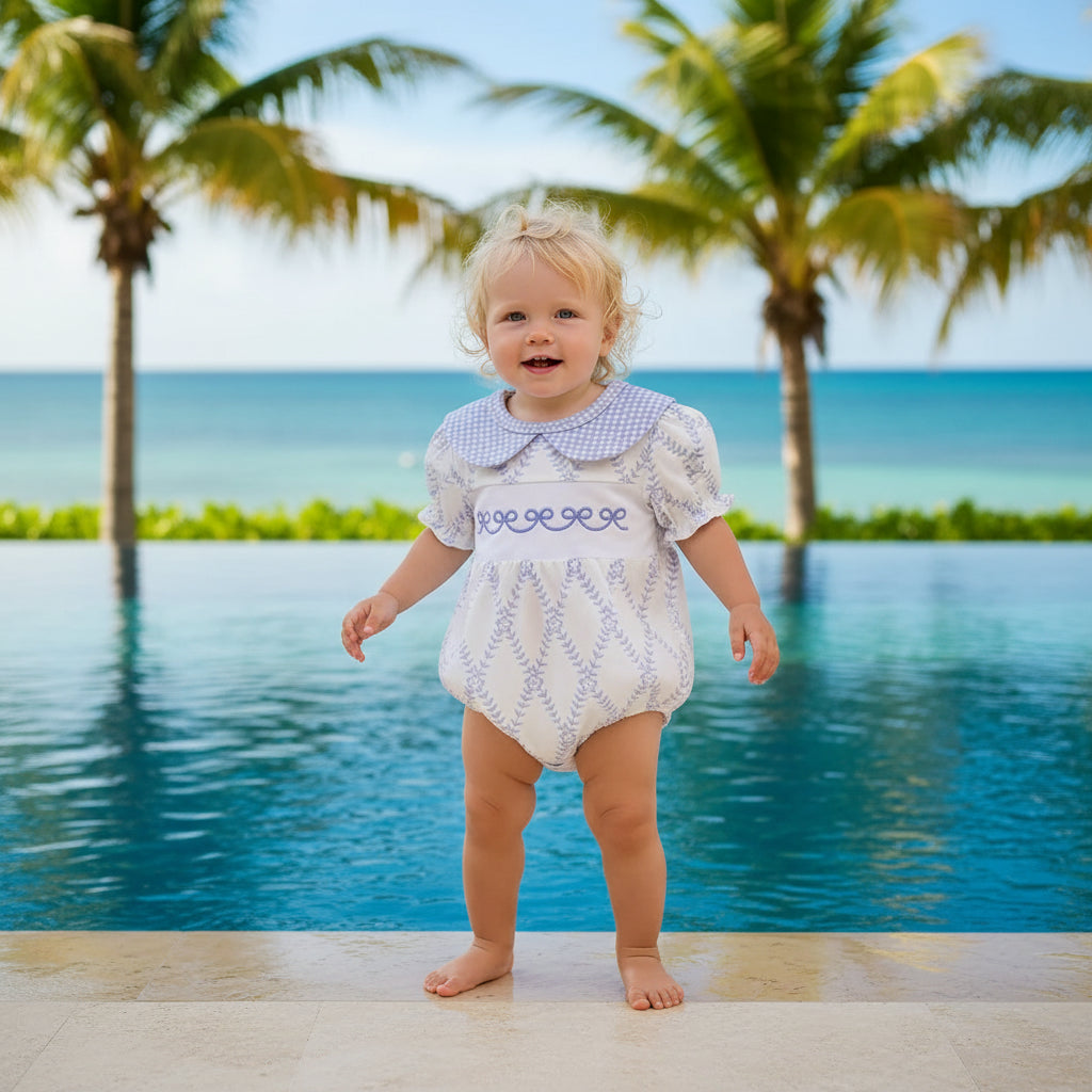 Baby blue romper with puff sleeves and embroidered pattern, featuring a checkered collar for infants