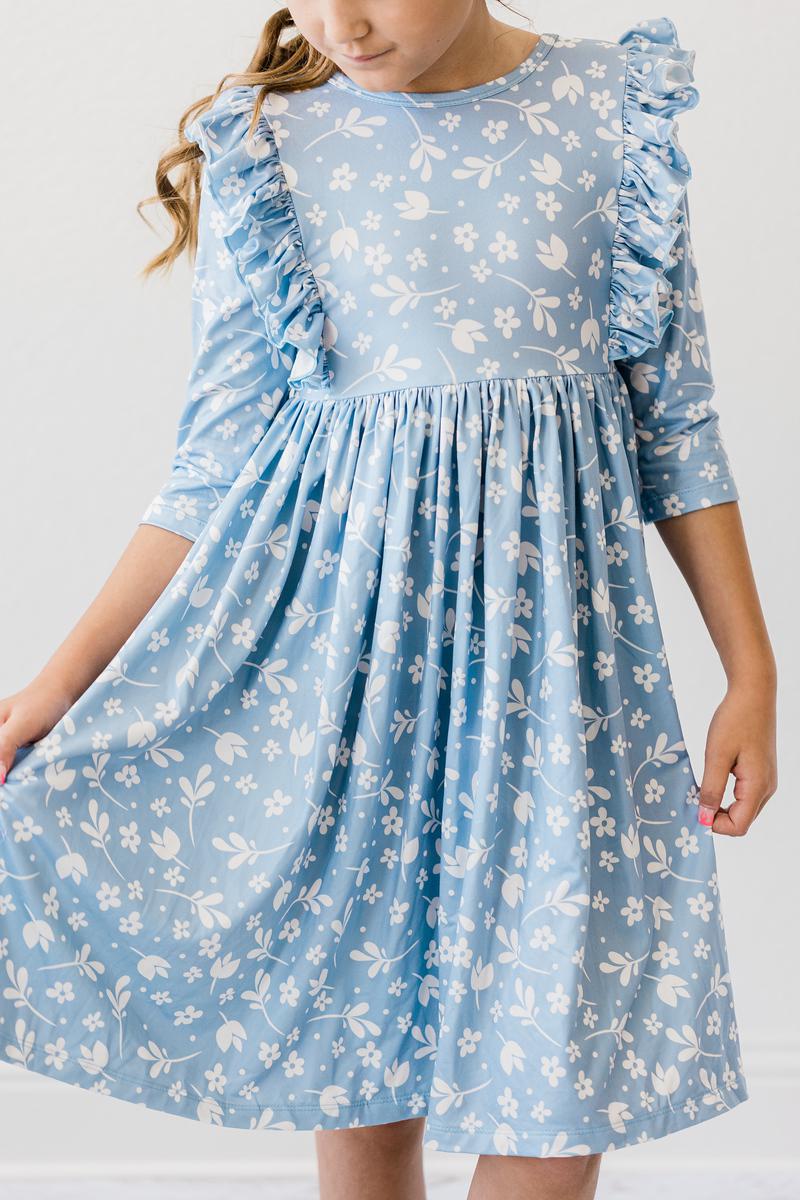 Girls blue ruffle twirl dress for girls with 3/4 sleeves and white floral print