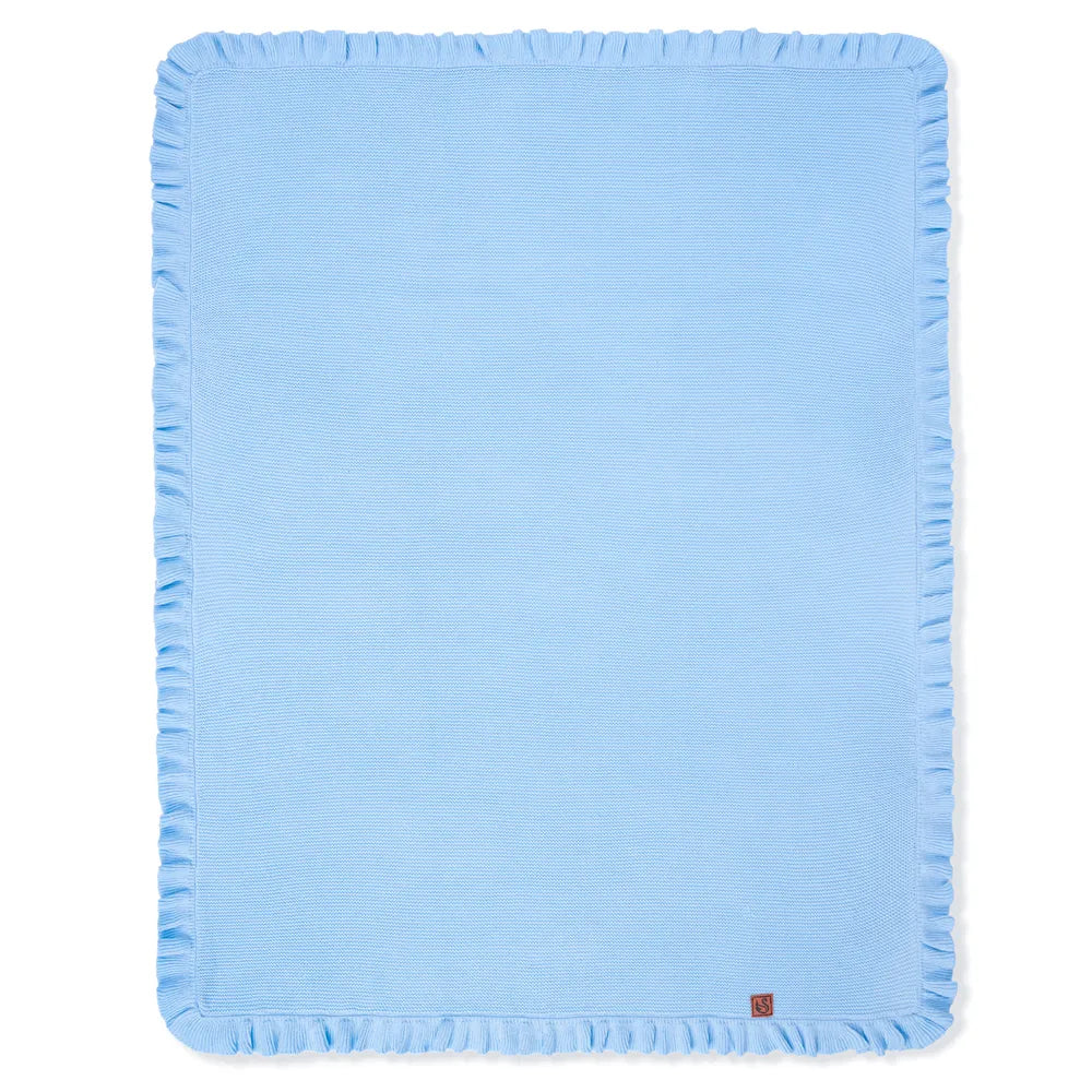 Unfolded baby blue garter stitch blanket with continuous ruffled border and corner tag