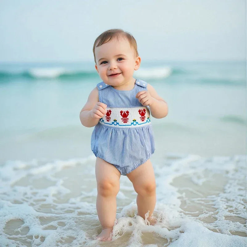 blue seersucker romper baby with red lobster embroidery, sleeveless design for infants at the beach