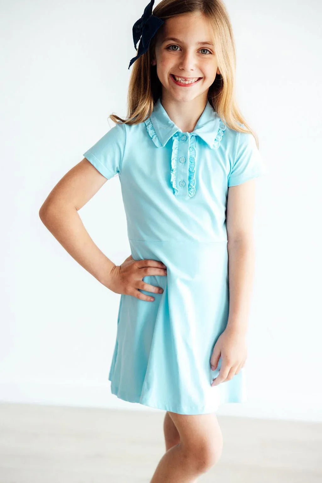 Girls light blue short sleeve bluebird polo dress for girls with ruffle collar detail