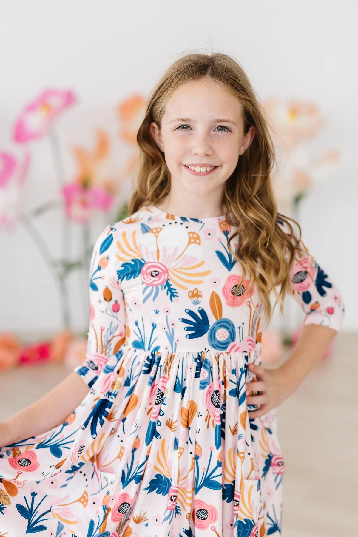 Blush peony girls twirl dress by Mila Rose, 3/4 sleeve with colorful floral print for young girls