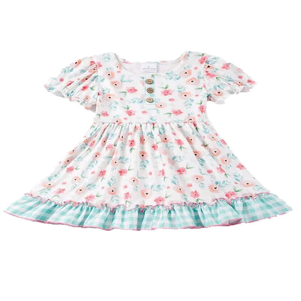 white boho floral dress for toddler girls with puff sleeves and green check ruffle hem