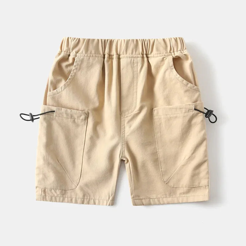 Beige boys cargo shorts with pockets for toddlers featuring elastic waistband and drawstring details