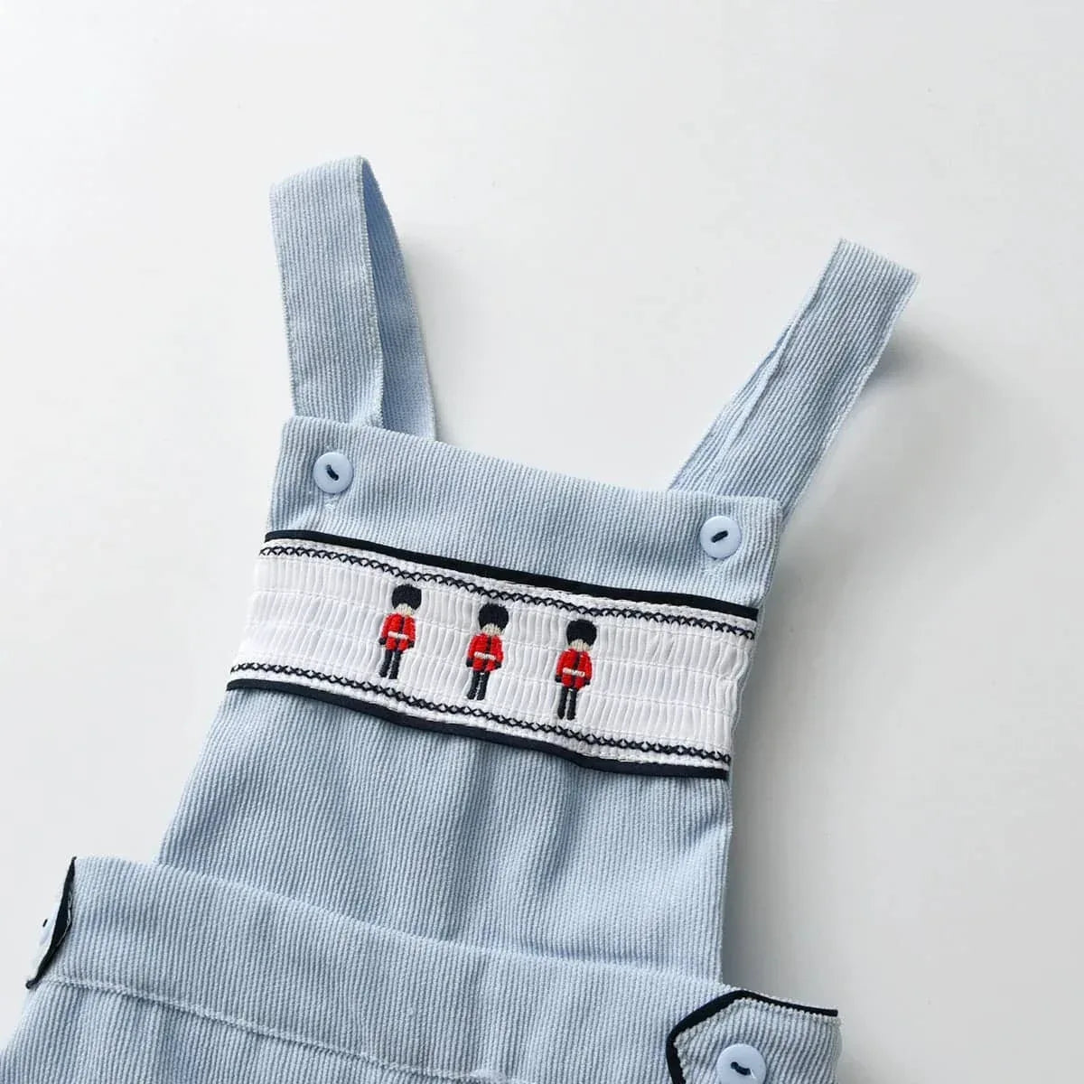 light blue boys embroidered romper set with embroidered red guards for babies and kids