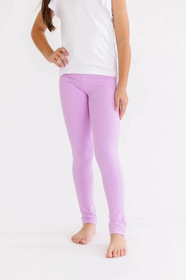 Bright lilac leggings for girls in toddler size with a soft, comfortable fit