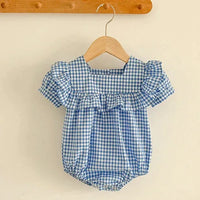 baby blue and white gingham bubble romper with puff sleeves and ruffle detail