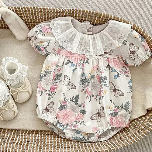 Girls floral bubble romper with lace collar and butterfly print for babies and kids