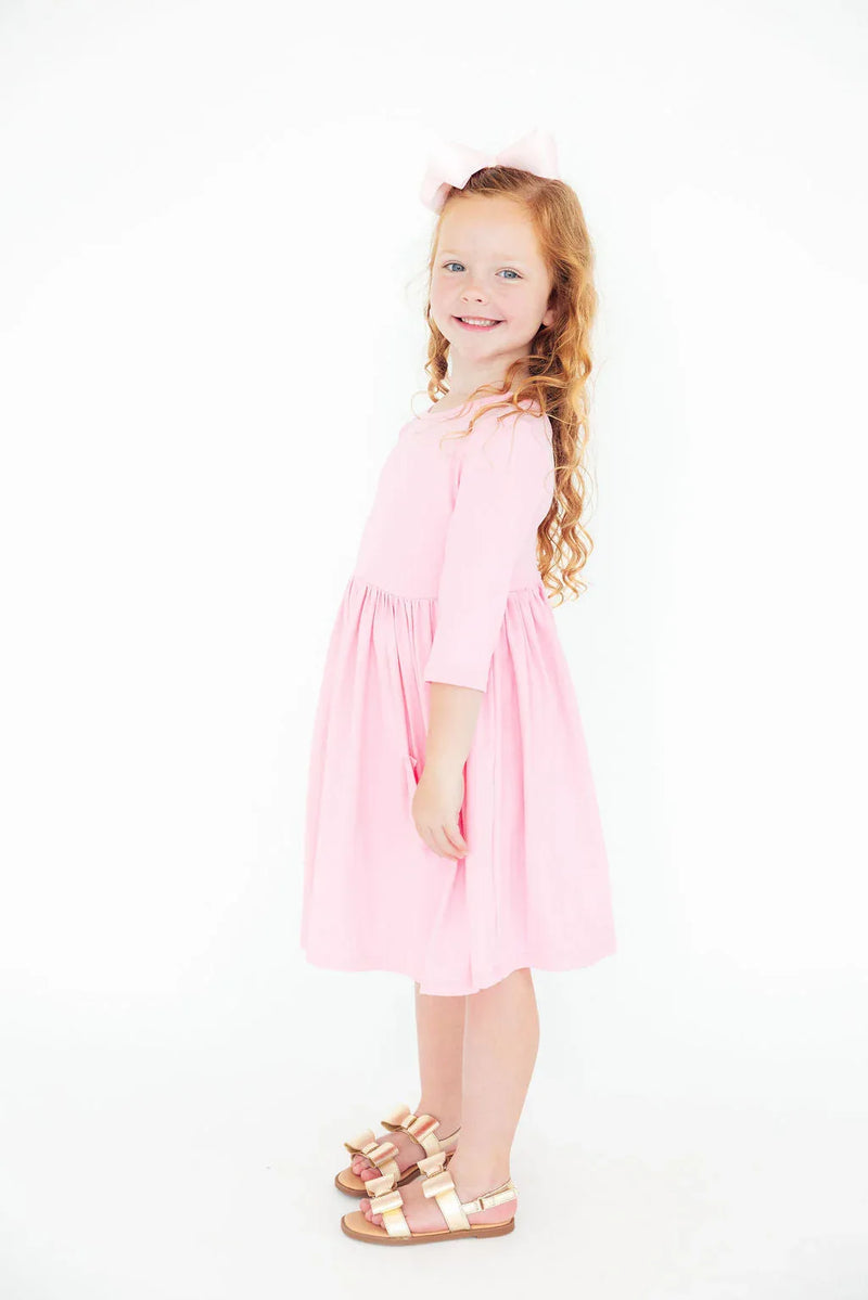 Bubblegum pink girls twirl dress 3/4 sleeve with pockets for toddlers by Mila & Rose