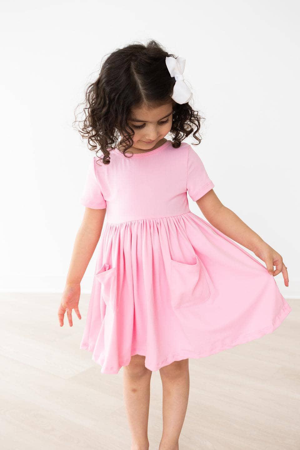 Girls bubblegum pink twirl dress for girls with short sleeves and pockets