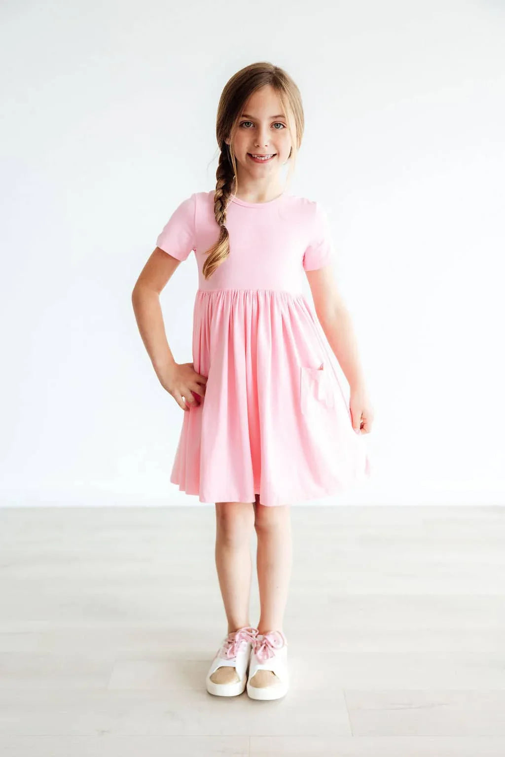 Bubblegum pink twirl dress for girls, short sleeve with pocket, knee-length and comfortable fit