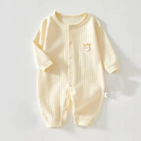 Cream knit bunny baby romper for infants with long sleeves and embroidered bunny detail