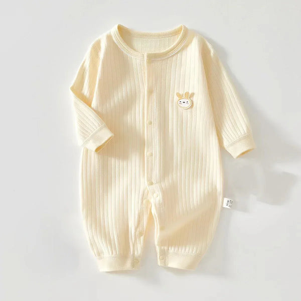 Cream knit bunny baby romper for infants with long sleeves and embroidered bunny detail