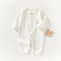 white ribbed bunny baby romper for infants with long sleeves and small bunny patch