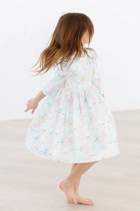Girls light blue bunny print girls twirl dress by Mila Rose with 3/4 sleeves and pocket detail