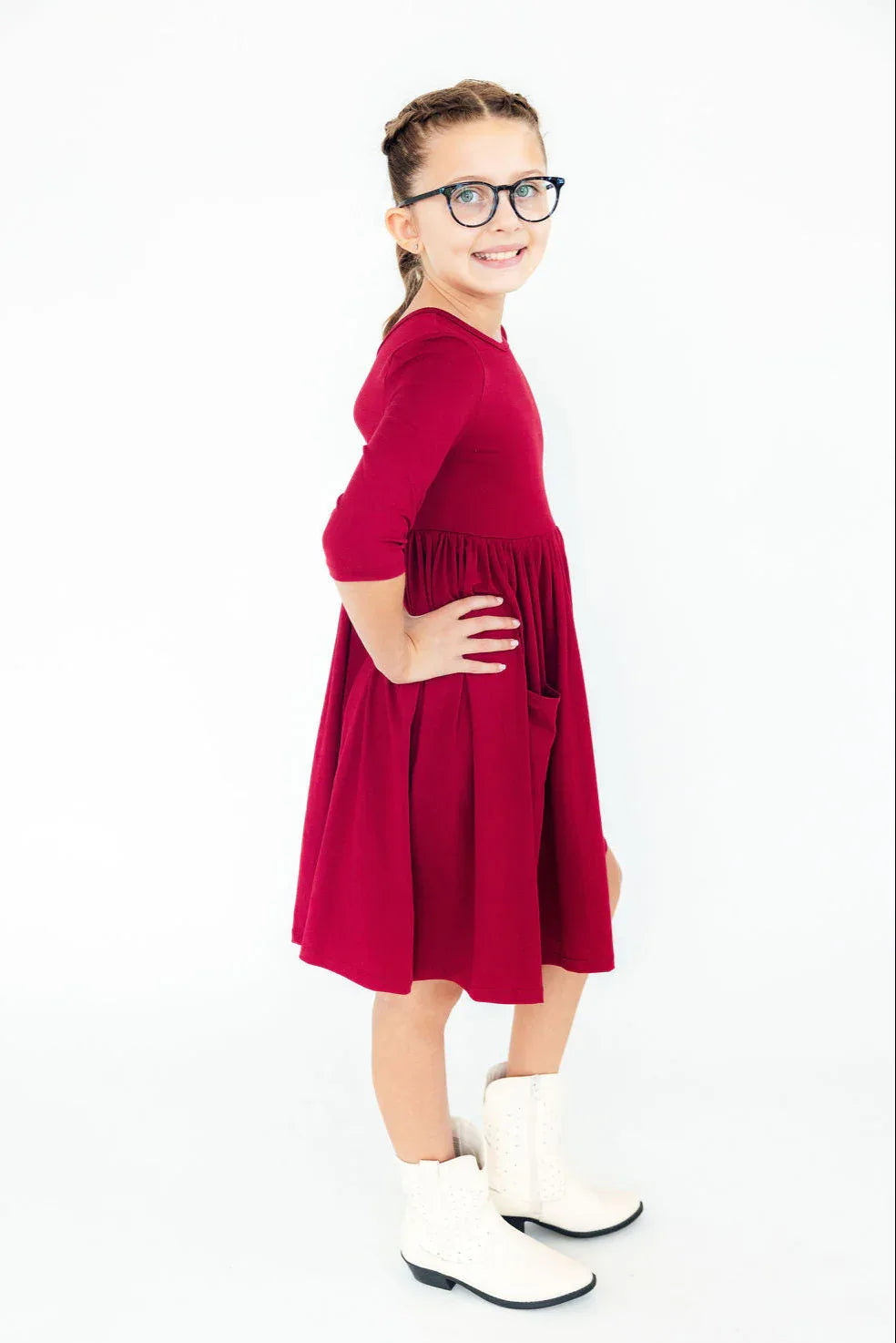 Burgundy twirl dress for girls by Mila & Rose with 3/4 sleeves and side pocket