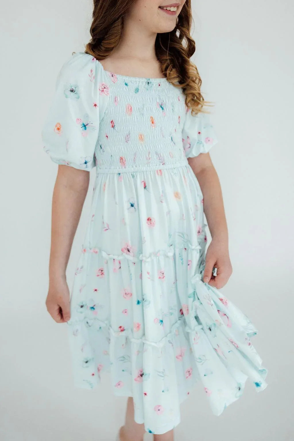 Girls light blue butterfly dress for girls with smocked bodice and puff sleeves by Mila & Rose