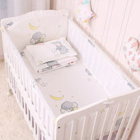 white baby crib bedding set with gray elephants and yellow moons for infants