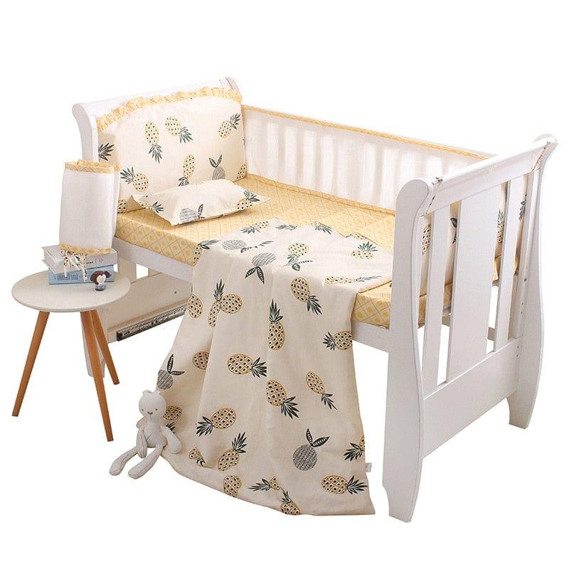Yellow and white cactus baby crib bedding set for infants with pineapple print and ruffle trim