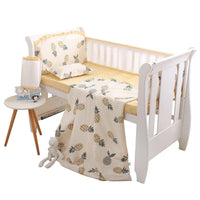 Yellow and white cactus baby crib bedding set for infants with pineapple print and ruffle trim