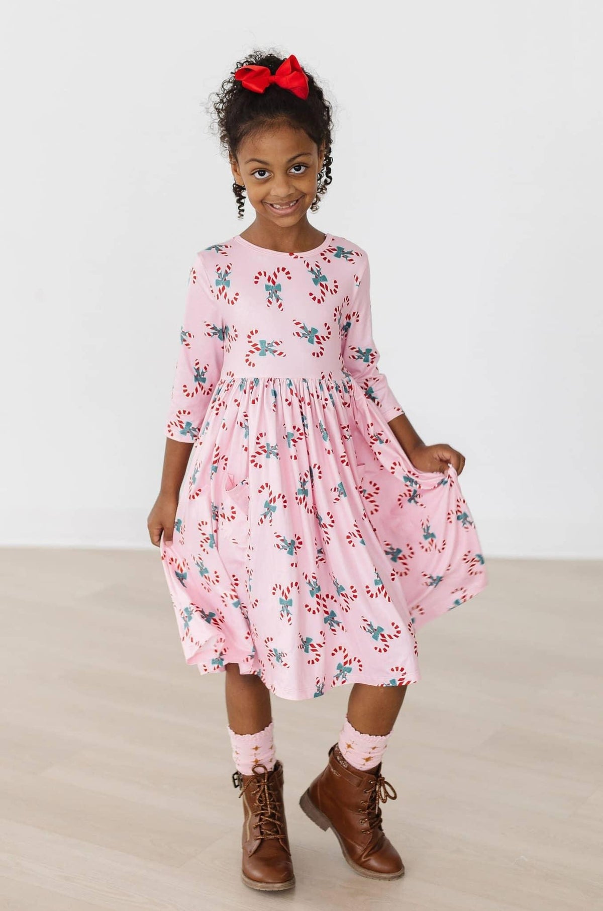 Girls pink candy cane dress for girls with 3/4 sleeves twirl pocket dress size small