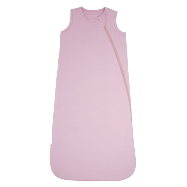 Pink baby sleeping bag on a white background