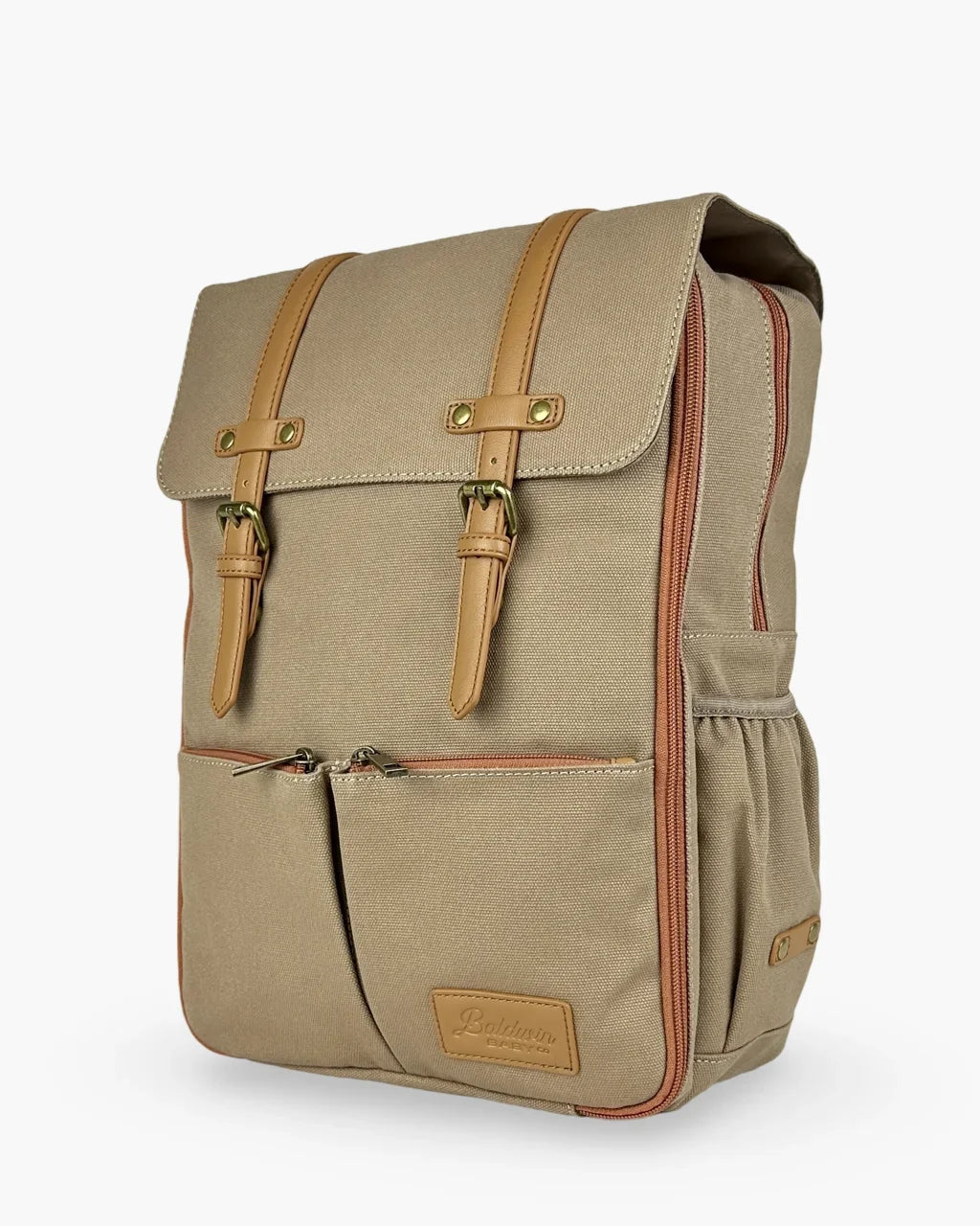 Three-quarter view of beige canvas diaper bag showing vertical rust zipper, expandable side pocket, and structured shape