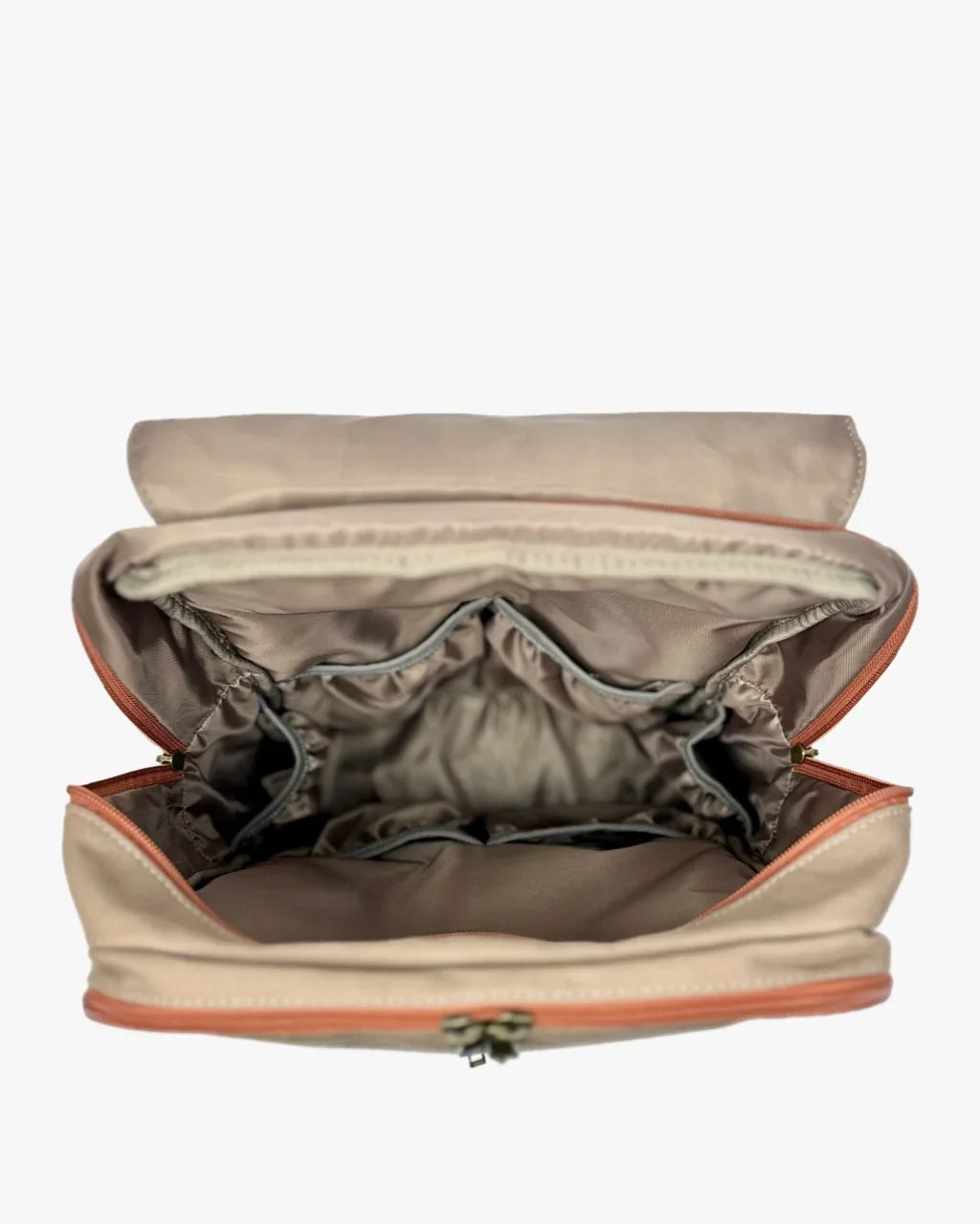 Interior perspective of open diaper bag showcasing taupe satin lining, elasticized organizational pockets, and wide opening