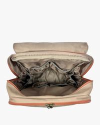 Interior perspective of open diaper bag showcasing taupe satin lining, elasticized organizational pockets, and wide opening