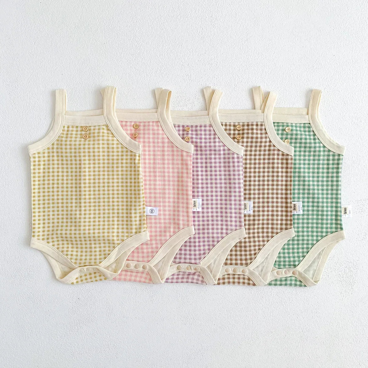 Checked baby summer romper in yellow pink purple brown and green with sleeveless design for infants