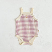 checked baby summer romper in pink and cream for infants with wooden button details