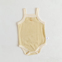 yellow and cream checked baby summer romper for infants with button detail and sleeveless design